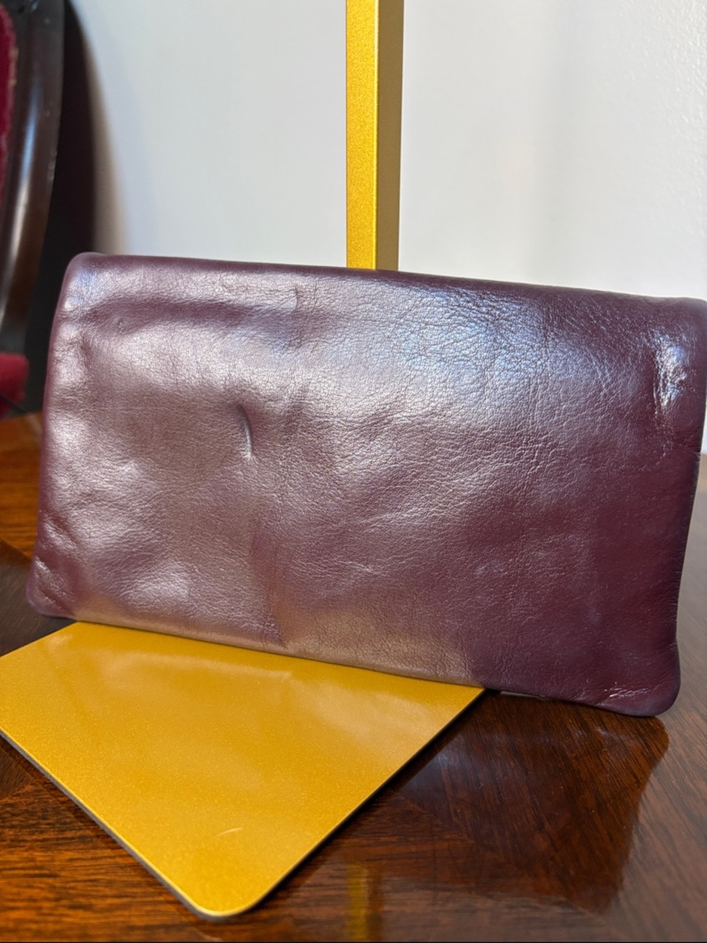 Aigner Women’s Burgundy Leather Clutch with Gold Accent - Picture 2 of 4